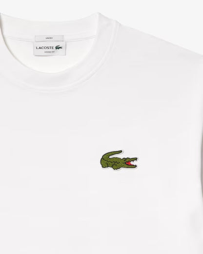 3223556